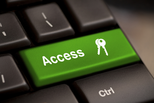 Image of a computer keyboard with a green key highlighted with the word "Access"
