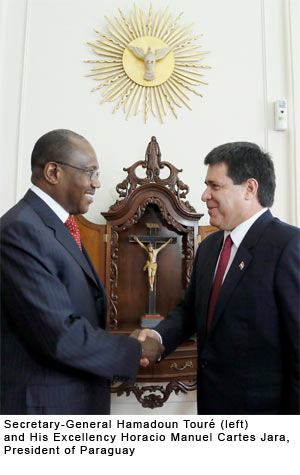 Secretary-General Hamadoun Touré (left) and His Excellency Horacio Manuel Cartes Jara, President of Paraguay 