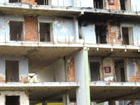 A building destroyed by war. Source: ITU/Melissa Arditto