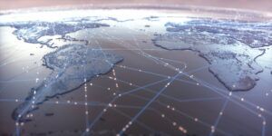 rendering of part of world globe with abstract lines crossing oceans and land in the sky above