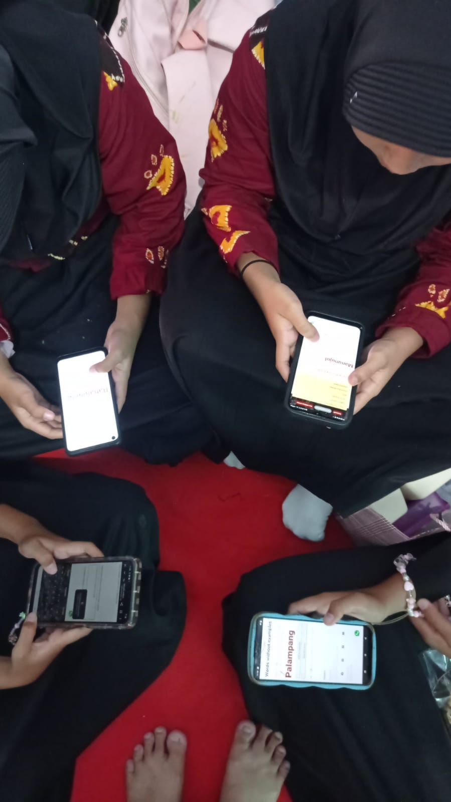 Students engaging in BASAkalimantan local language word game