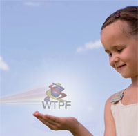 Photo: girl holding WTPF logo